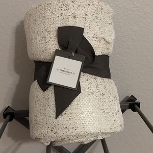 Gold and white throw